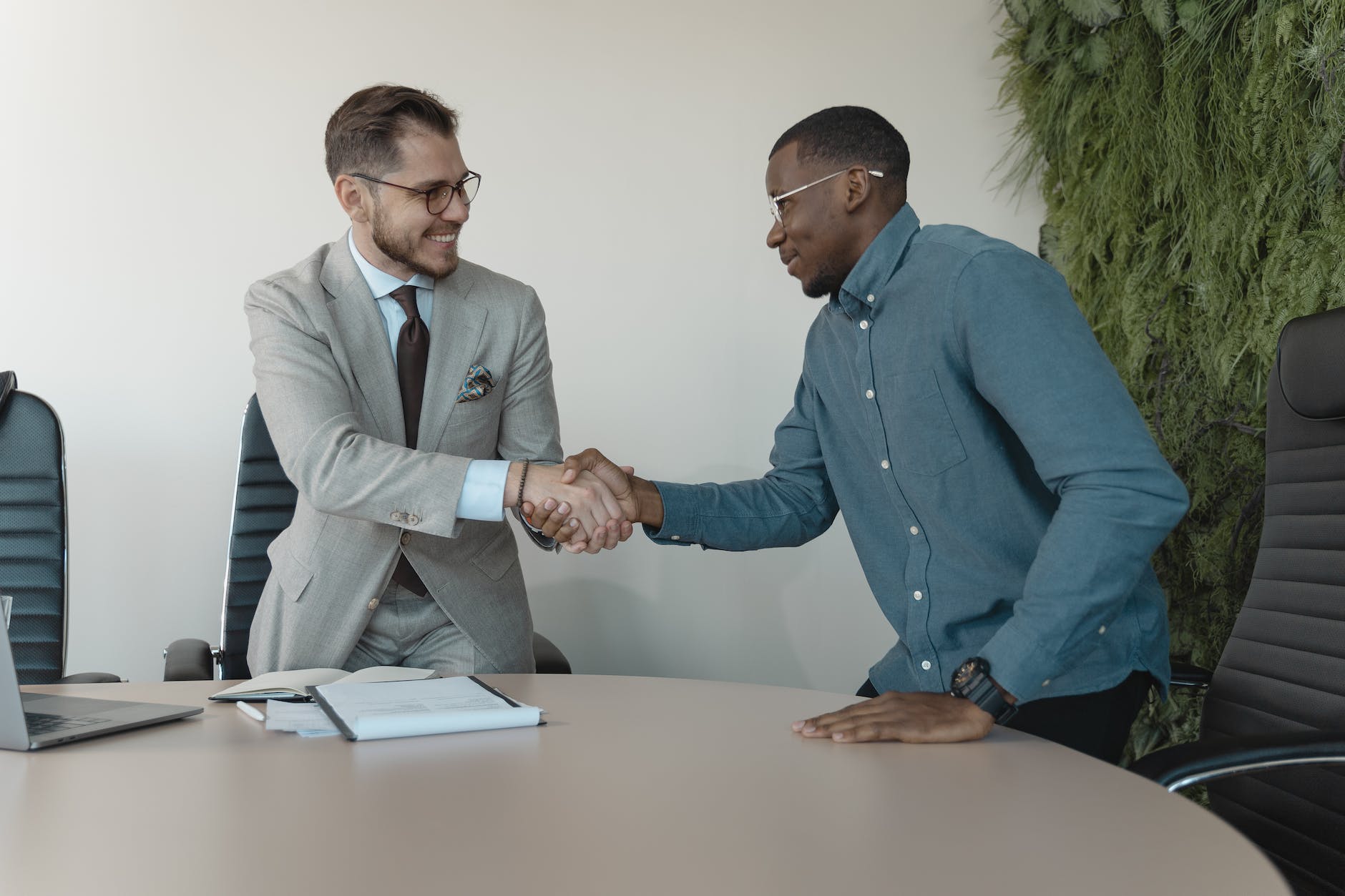 man in blue long sleeve shirt gets the job